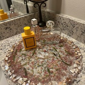 Custom made resin board filled with dried flowers and abalone stones